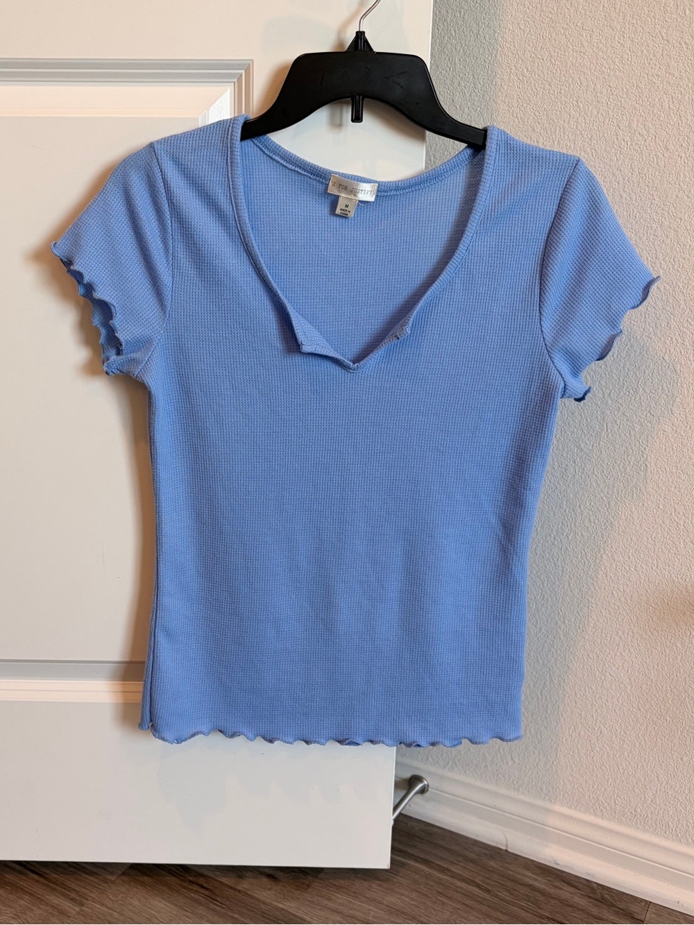 J for Justify blue top